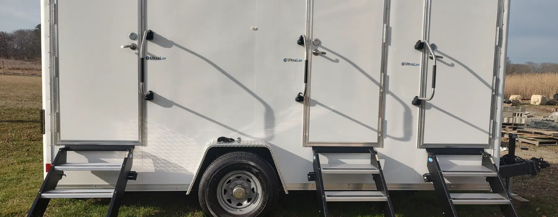 A Restroom Trailers Co trailer set up on site