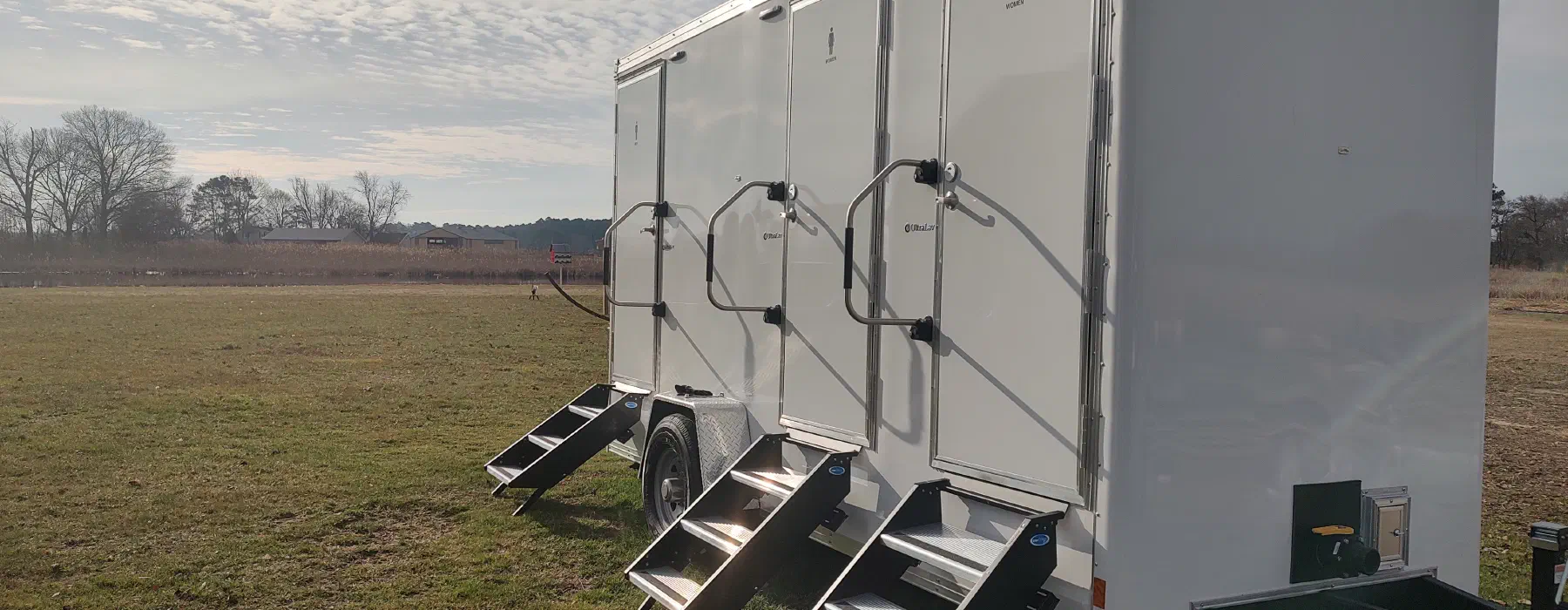A Restroom Trailers Co trailer set up on site