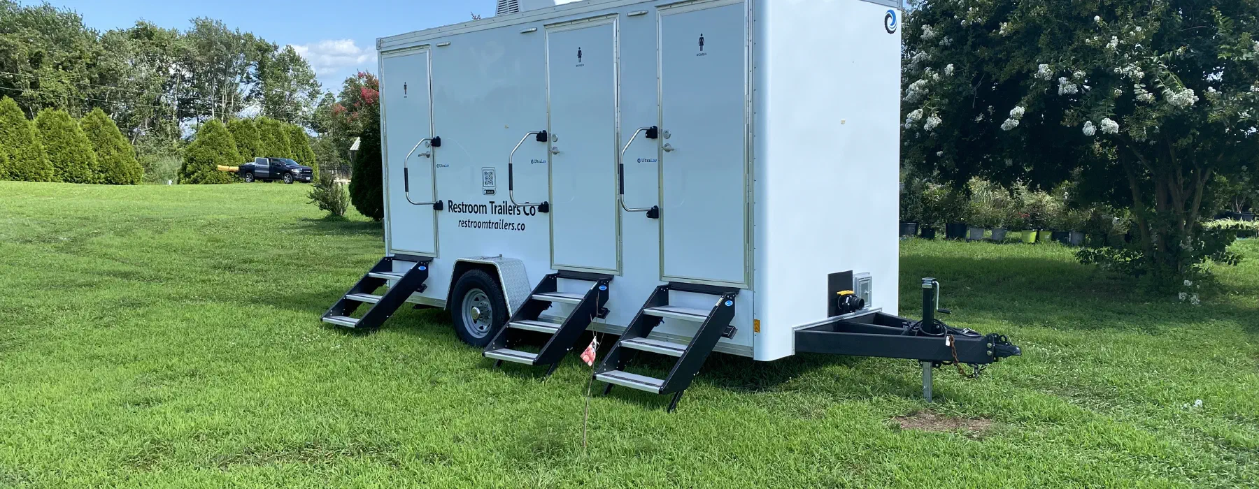 A Restroom Trailers Co trailer set up on site